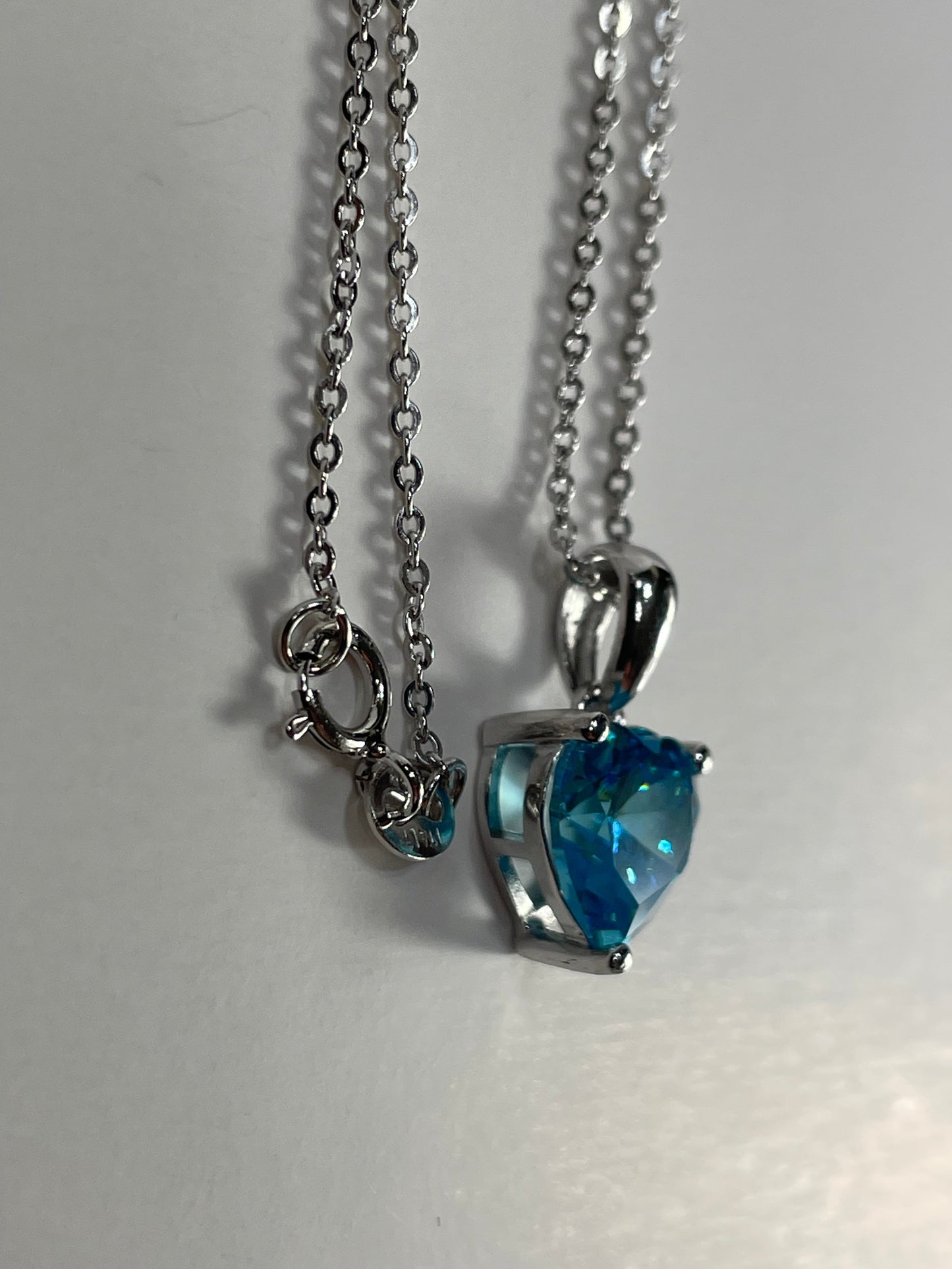 Sterling Silver Necklace with LIGHT BLUE Cubic Zirconia Heart Pendant